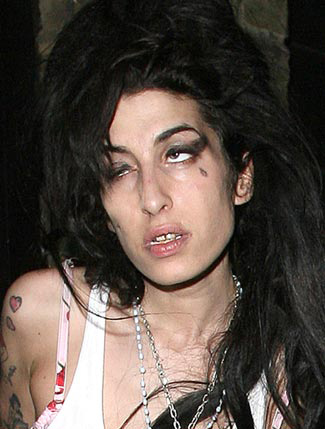 She may try to hide it with industrial strength makeup but wino Winehouse 